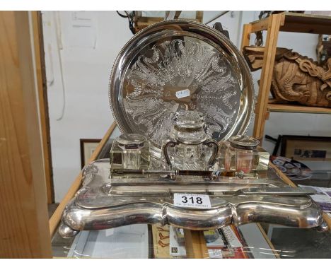 A good quality early 20th century silver plate inkstand, an inkwell, a pen with silver mount and&nbsp; a silver plate tray.