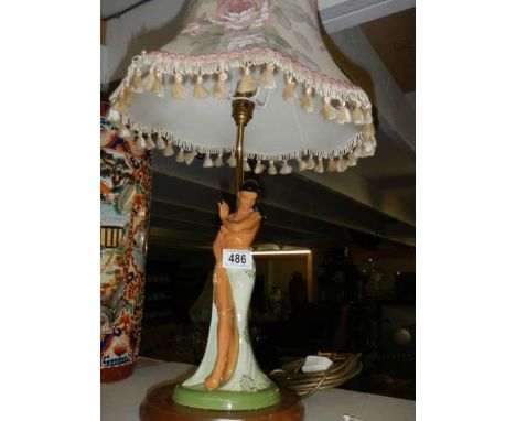 A good table lamp featuring a dancing lady.