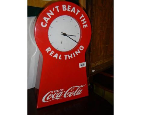 A Coca Cola clock.