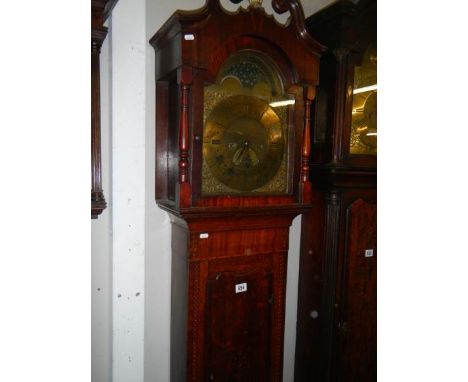 A good eight day long case clock with brass arched dial