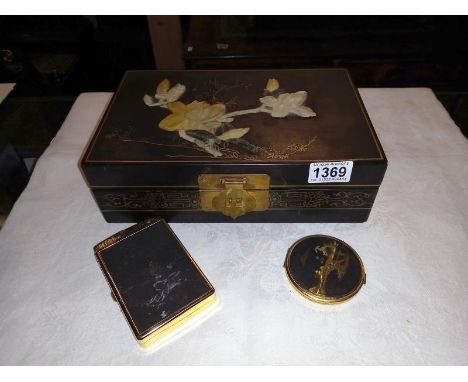 A vintage oriental lacquered box, cigarette case/lighter &amp; powder comport
