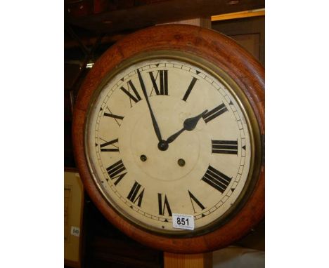A circular wall clock.