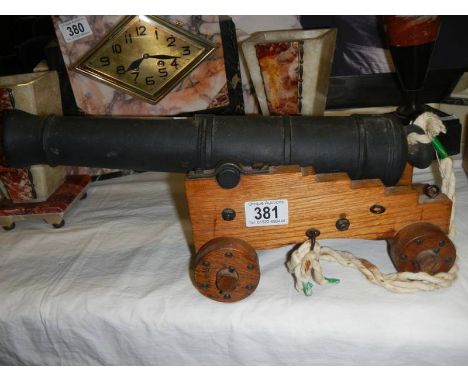 A 1/8th scale 32 pounder muzzle loading ships cannon, (Nelson Era).Carriage length 23cm.Width 11.5cmWidth including whells 16