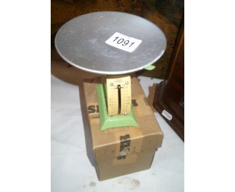 A smallvintage salter spring balance postal scales