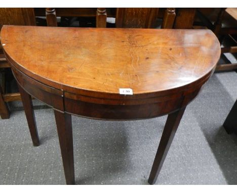 A Victorian fold over card table.&nbsp;