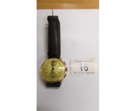 An 18ct gold chronograph, Venus 170 movement, working order, light gold coloured dial, 36mm diameter, black leather strap, ca