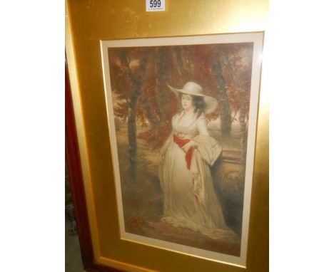 An early 20th century signed print of a lady in woods signed Frank Strasburg, 58 x 78 cm.