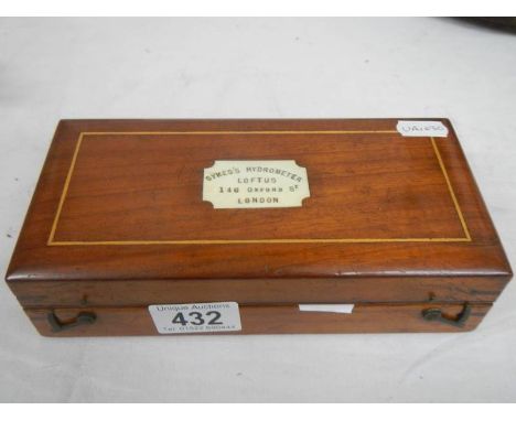 A mahogany cases Sykes's Hydrometer.