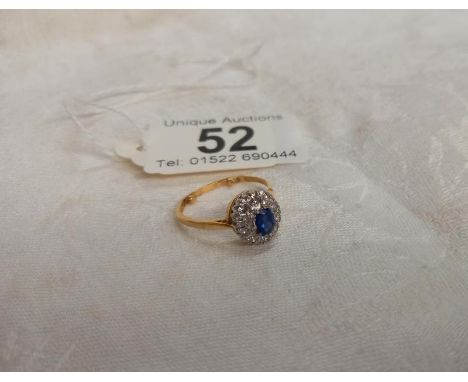 A diamond and sapphire cluster ring, dated and hall marked Birmingham 1967, size N half, 3.4&nbsp; grams.