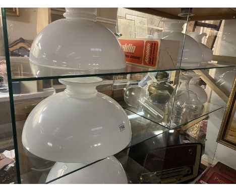 A good selection of Victorian hanging oil lamp glass shades &amp; chimneys (5 shelves)
