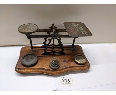 A set of Victorian brass postal scales with weights,&nbsp;