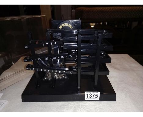 A ball bearing time machine clock