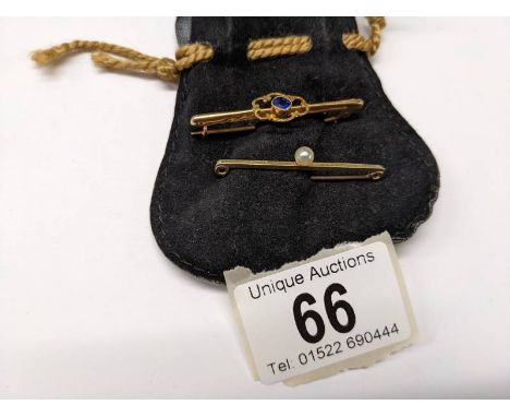 A 19th century bar brooch, 15ct gold stamped together with a pearl and sapphire set brooch hall marked 9ct.