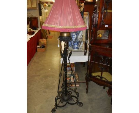 A 19th century wrought iron standard lamp with shade, COLLECT ONLY.