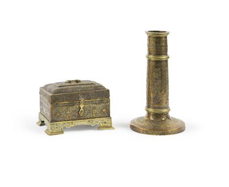 Un bougeoir et un coffret en laiton ajouré, Perse XXe siècle An openwork brass candlestick and casket, Persia, 20th Centuryth
