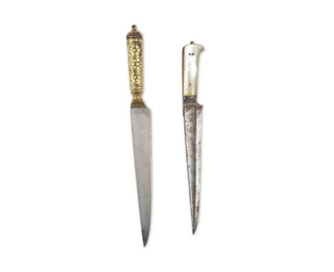 Deux dagues en acier (kards), Inde XIXe siècle Two steel daggers (kards), India, 19th Centuryeach with single-edged steel bla