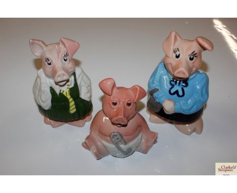 Three Wade Nat West piggy banks 