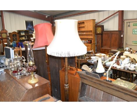 A turned standard lamp with white shade 