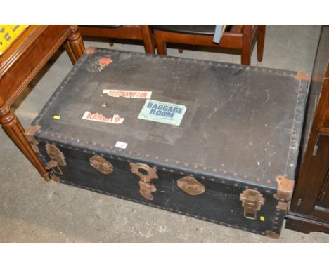 A travelling trunk and contents of various roller posters etc.