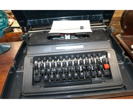 A Wilding TW1000 portable typewriter in fitted case 