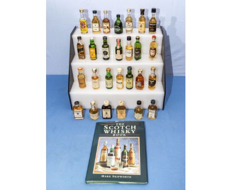 Collection of miniature whisky and a Scotch Whisky book
