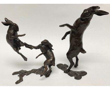 Richard Cooper foundary cast bronze of a pair of Hares boxing, 13cm high; another, Hare standing, 15cm high (2) 