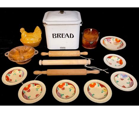 A white enamel bread bin and cover, wooden rolling pins, a ceramic hen shaped egg basket, an Art Deco fruit set, a treen dish