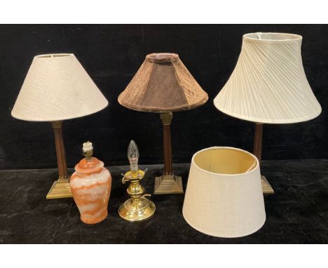 A pair of Laura Ashley Corinthian column table lamps; another similar; an alabaster table lamp, with internal light; etc (5) 