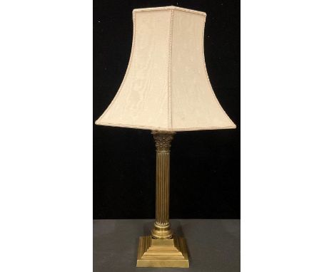 A late 19th/early 20th century Neo-Classical style brass Corinthian column table lamp, stepped square base, splayed hexagonal