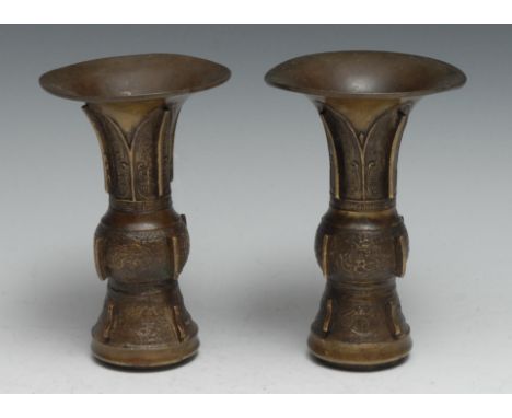 A pair of Chinese bronze gu vases, cast in the archaic taste, 15cm high, 19th century 