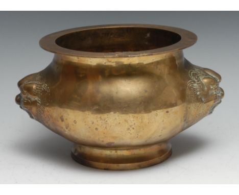 A Chinese gilt bronze censer, cast with masks, 18cm diam 
