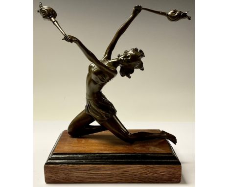 An Art Deco style bronze, as a torch dancer, rectangular wooden base, 27cm high 