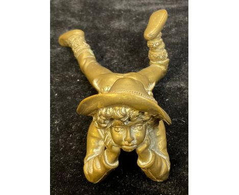 French School (early 20th century), a gilt bronze, of a young boy finely dressed, 13cm long 
