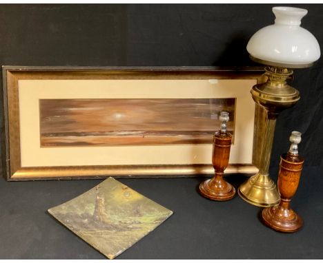 A brass oil lamp converted for electricity; a pair of oak candlesticks; a light house painting embellished with abalone shell