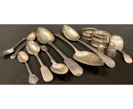 A George III silver serving spoon, London 1813; others, London 1805 and George IV, London 1827; a George III silver caddy spo