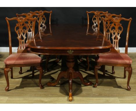 A contemporary George III style extending dining table, 74.5cm high, 175cm extending to 251.5cm long, 112cm wide; a set of si