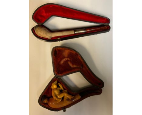 A 19th century Meerschaum sailor cheroot pipe; a silver mounted clay pipe; both cased (2) 