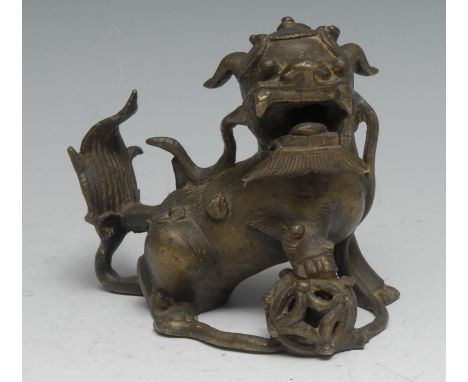 Chinese School (19th century), a bronze, of a temple dog or kylin, 10.5cm high 