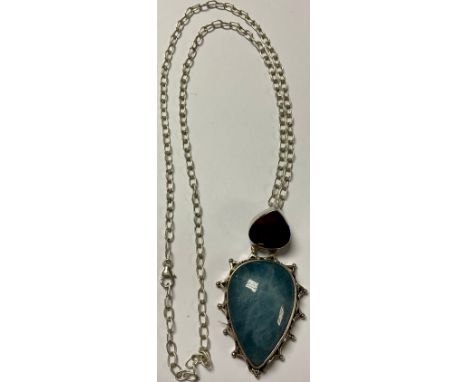A sterling silver mounted faceted ruby and polished aquamarine droplet pendant, sterling silver necklace chain, boxed 