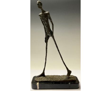 A contemporary bronze sculpture, after Giacometti, Walking Man, shaped rectangular marble base, 45cm high 