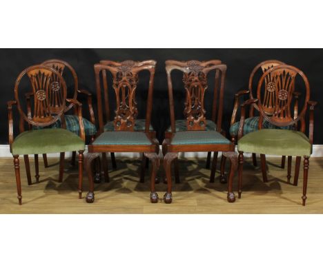 A set of four Chippendale design dining chairs, 99cm high, 56cm wide, the seat 44cm wide and 38cm deep; a set of four Hepplew
