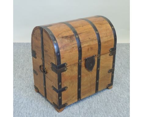 A metal bound hardwood dome top trunk, 37cm