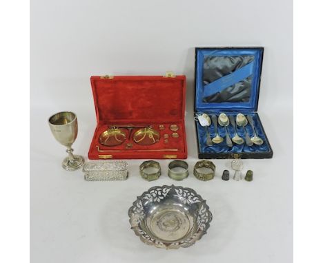 A collection of silver and plated items, to include a trophy cup, together with a set of brass postal scales, cased