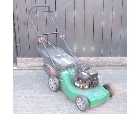 A Qualcast petrol rotary lawn mower 