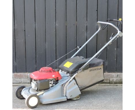 A Honda rotary petrol self-propelled lawn mower