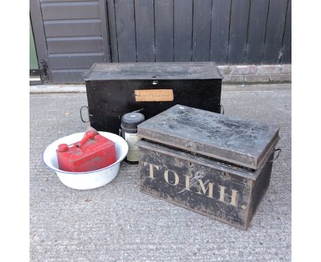 A black painted tin trunk, 73cm, together with two smaller, a jerry can and other items