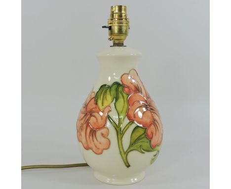 A modern Moorcroft cream glazed table lamp, 28cm tall