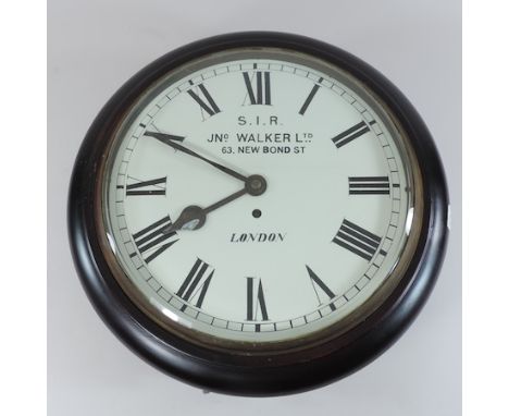 A mahogany cased dial clock, with a painted dial, 42cm overall