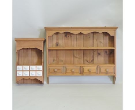 A pine wall shelf, 98cm, together with another smaller, containing drawers