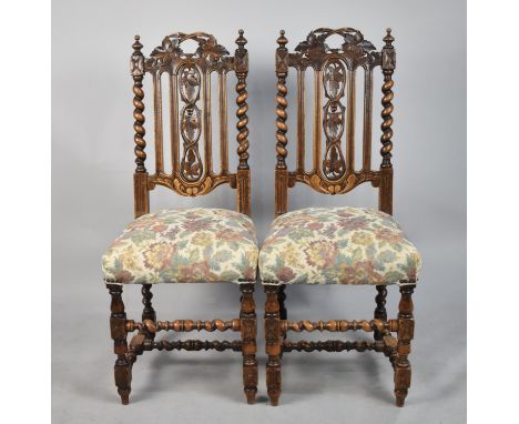 A Pair of Gothic Revival Oak Side Chairs with Tapestry Upholstery and Barley Twist Supports, One with Glued Back Leg 